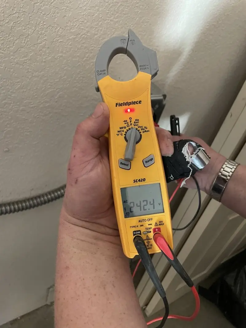 Voltage testing with clamp meter during Generator Installation in Ladera Heights